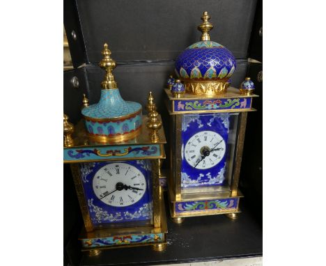 Modern Oriental mantel clock in cloisonne and enamel finished case together with a similar example with battery movement (2)