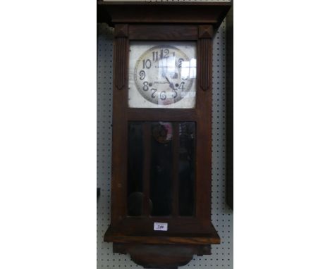 H D Edwards, Macclesfield, oak cased wall clock with glazed door