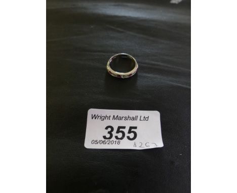 A 9k white gold gem set half hoop eternity ring, weight approx. 1.6g