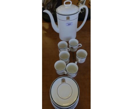 A Wedgwood House of Commons coffee pot and six cups and saucers.