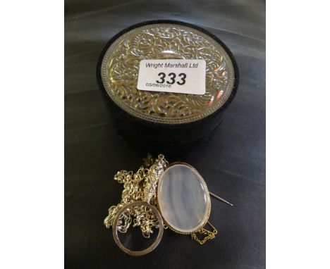 A white banded agate brooch, together with, a shield stick pin, a white metal eye loop and belcher link chain, to a circular 