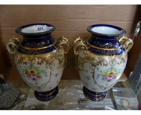 A pair of Noritake gilt floral decorated double handled vases.
