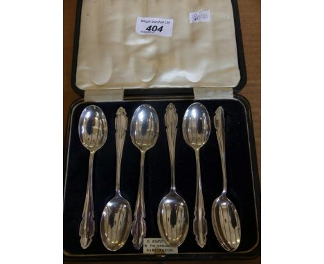 A cased set of six Sheffield hallmarked silver teaspoons the case bearing retailers label for R Bond & Co Darlington, silver 
