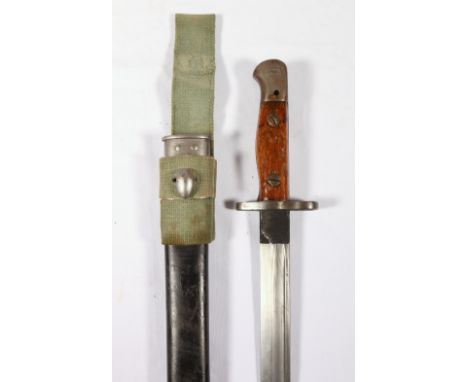 British sword bayonet pattern 1907 having fullered blade with ricasso stamped Wilkinson 9 13 (September 1913) and wood grip c