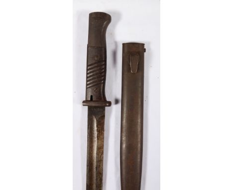 German knife bayonet having fullered blade with ricasso stamped '44 fze' and bakelite grip, complete with scabbard, blade len