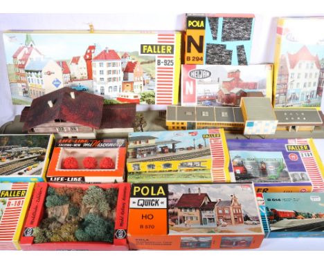 Extensive collection of N gauge model railways accessories including kit built buildings, Merit trees, rail station, etc, som