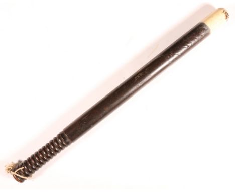 19th century Ayr Constabulary truncheon of tapering form with cream painted tip and turned ribbed grip, the shaft stamped AYR