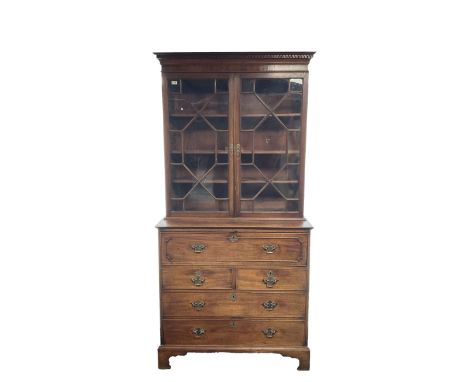 19th century mahogany secretaire bookcase, projecting cornice, dentil frieze, two astragal glazed doors above single fall fro