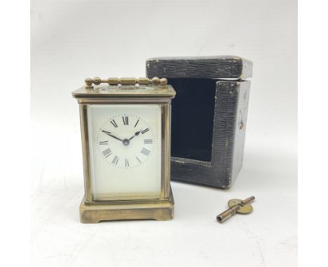 Early 20th century brass and bevelled glass carriage timepiece clock, white enamel Roman dial, single train driven eight day 