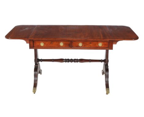  A George III mahogany sofa table  , circa 1810, with two short frieze drawers to one long end, 73cm high, 152cm wide (extend