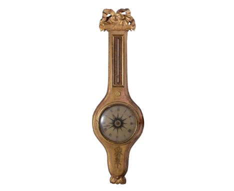  A French giltwood cased wall timepiece  , 19th century, almost certainly a wheel barometer case converted to take an associa