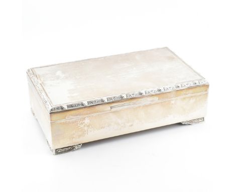 A hallmarked silver Elkington &amp; Co wood lined box. The box with engine turned decoration to the lid with decorated rim to