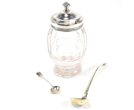 A George IV silver topped conserve pot hallmarked Sheffield 1828 together with a silver parcel gilt sifting ladle spoon hallm