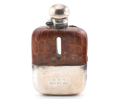 A 1920s hallmarked silver leather bound hip flask. The hip flask engraved N.P.T Sept 9th 1922.&nbsp;Hallmarked Sheffield 1921