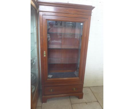 A mahogany inlaid display cabinet with a base drawer adapted from an old Edwardian wardrobe with three glass shelves, one spa