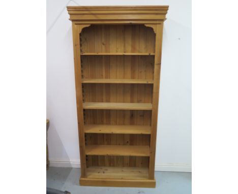 A modern pine bookcase with adjustable shelving, 210cm tall x 100cm wide x 27cm deep, shelf depth 22cm 