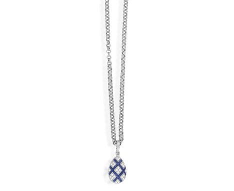 FABERGÉ: A SAPPHIRE, DIAMOND AND ENAMEL PENDANT NECKLACEThe detachable egg-shaped pendant locket set with calibré-cut sapphir