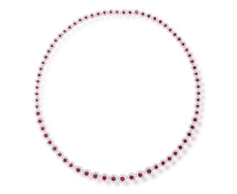 A RUBY AND DIAMOND NECKLACE Designed as a graduated continuous row of circular-shaped motifs, each set with a circular-shaped