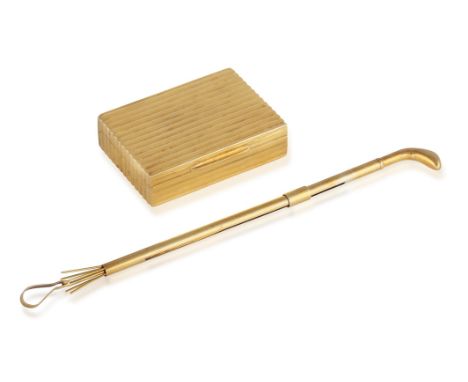 A GOLD PILL BOXThe rectangular box with reeded decoration, opening to reveal a polished interior, in 18K gold, Italian regist