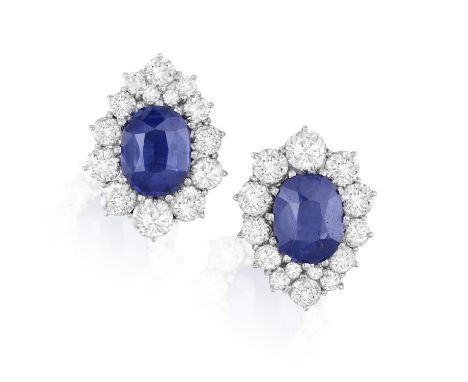 A PAIR OF SYNTHETIC SAPPHIRE AND DIAMOND EARRINGS Each of drop-shaped cluster design, centring a cushion-shaped synthetic sap
