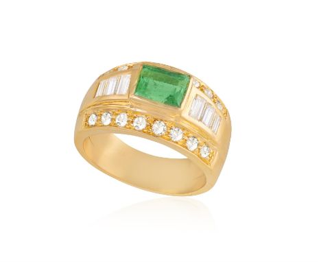 AN EMERALD AND DIAMOND DRESS RINGThe broad band centring a rectangular-shaped emerald weighing approximately 1.2cts, flanked 