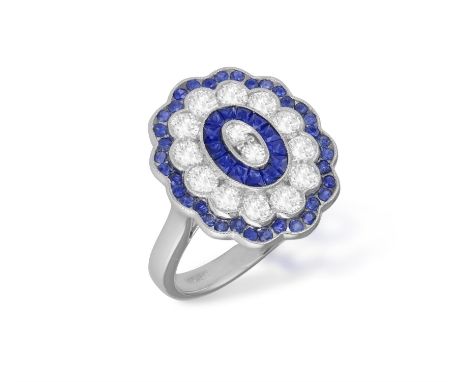 A SAPPHIRE AND DIAMOND DRESS RINGOf target scalloped design, set with brilliant-cut diamonds within calibré and circular-cut 