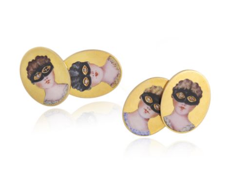 A PAIR OF ENAMEL AND DIAMOND CUFFLINKSEach oval-shaped cufflink applied with a masked lady in enamel, to old-cut diamond eyes