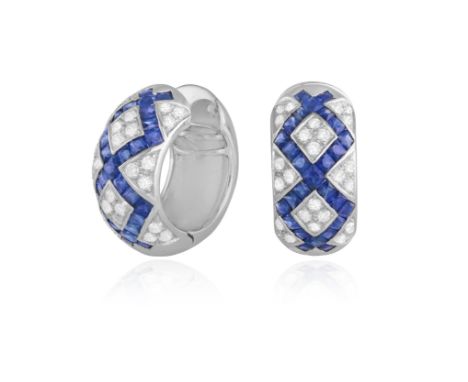 FABERGÉ: A PAIR OF SAPPHIRE AND DIAMOND EARRINGSEach of hoop design, set to the front with calibré-cut sapphires in a geometr