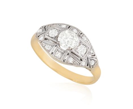 AN EARLY 20TH CENTURY DIAMOND RINGOf tapered oval-shape design, the pierced motif centring an old-cut diamond weighing approx