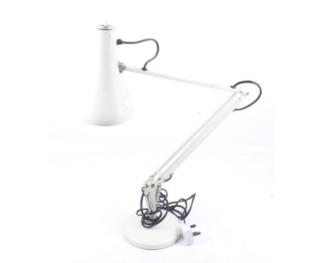 A mid-century Herbert Terry anglepoise desk lamp. Model 90, cream, with circular weighted base. 