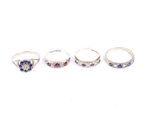 Four 9ct gold and gem set rings. Comprising a three stone garnet ring, size G/H, 1.2g gross, a diamond and sapphire half eter