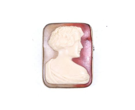A Czechoslovakian Art Seco cameo brooch. In a gold coloured metal rectangular mount, marked '18K', 13.6g gross. L3.5cm