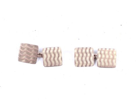 A pair of 9ct gold square engine-turned cufflinks With chain interlinks, 6g