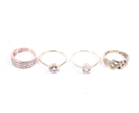 Four gold and gem set rings. Comprising a solitaire, stamped '10K', size P/Q, 2g gross, a solitaire stamped '10K', size S, 1g