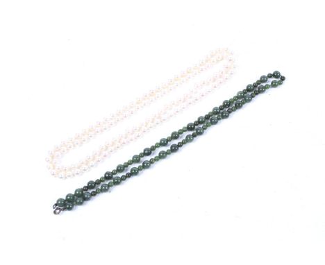 Two vintage necklaces. Comprising a cultured-pearl single-row continuous necklace, the beads approx. 6.5-6.75mm diameter knot
