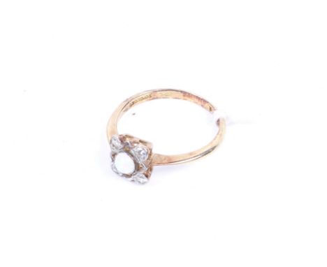 An early 20th century gold, white opal and diamond small square cluster ring. Stamped '18ct & Pt', size K, 2g gross