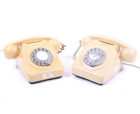 Two circa 1970s cream coloured rotary dial telephones, model GPO 746. H13cm