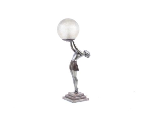 An Enrique Molins-Balleste (1893-1958) Art Deco style spelter table lamp. In the form of woman holding a ball on a stepped ma