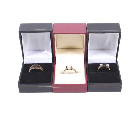 Two 9ct gold and gem set rings and a 'Fix' ring set with a cultured-pearl. Comprising a very dark-blue oval sapphire and cubi