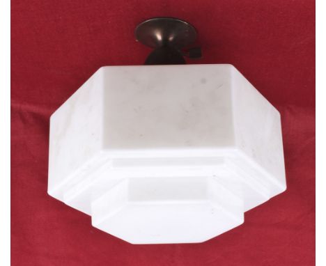 An Art Deco hexagonal opaline glass pendant ceiling lamp shade. A large geometric shape with a single step at the top and thr