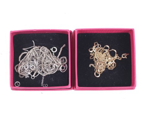 A damaged 9ct gold fine necklace and various other necklaces and chains. The gold chains weigh approx. 3.3g gross; the silver