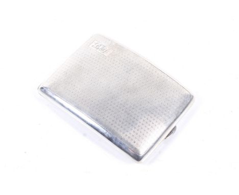 A George V silver engine turned concave-oblong cigarette case. The covers decorated with small chevrons and with a rectangula