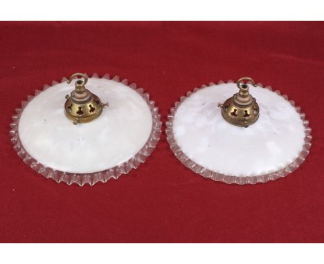A pair of French opaline white glass ceiling pendant lamp shades. Featuring clear glass crimped edge, with brass gallery. Dia