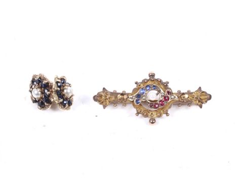 An Edwardian 9ct gold brooch and a pair of modern stud earrings. The blue and white paste cluster brooch with pierced details