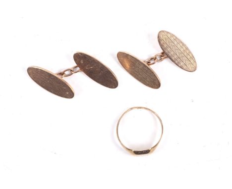 A pair of 9ct gold oval twin panel cufflinks and an oblong signet ring. The cufflinks hallmarked Saunders & Sheperd London 19