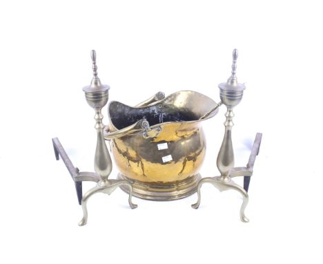 A Victorian brass coal bucket, pair of 20th century fire dogs and a fork. The bucket with a single handle, H26cm, the fire do