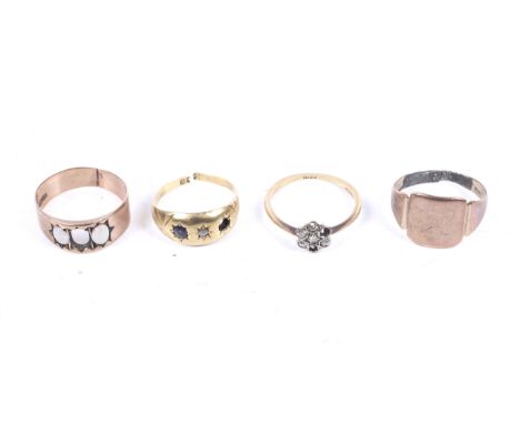 Four gold and gem set rings. Comprising a diamond five (of seven) stone cluster ring, stamped '18ct', size O, 1.7g gross; two