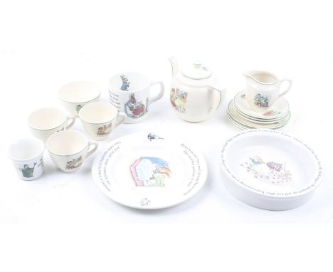 A collection of vintage ceramics for children. Including a Wedgwood Beatrix Potter dish and cup, a 1950s tea service featurin