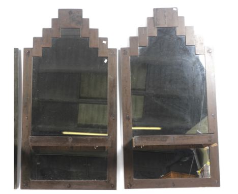 A pair of contemporary retro style metal framed wall mirrors. With a built-in shelf, welded metal stepped arch top frame with