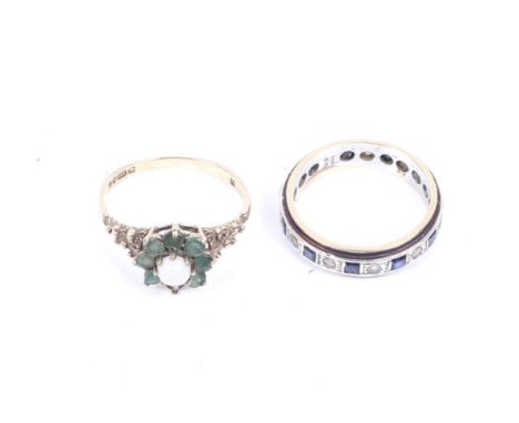 Two 9ct gold and gem set rings. Comprising a small white opal and emerald cluster ring. Size M, 1.8g gross; and a blue and ne
